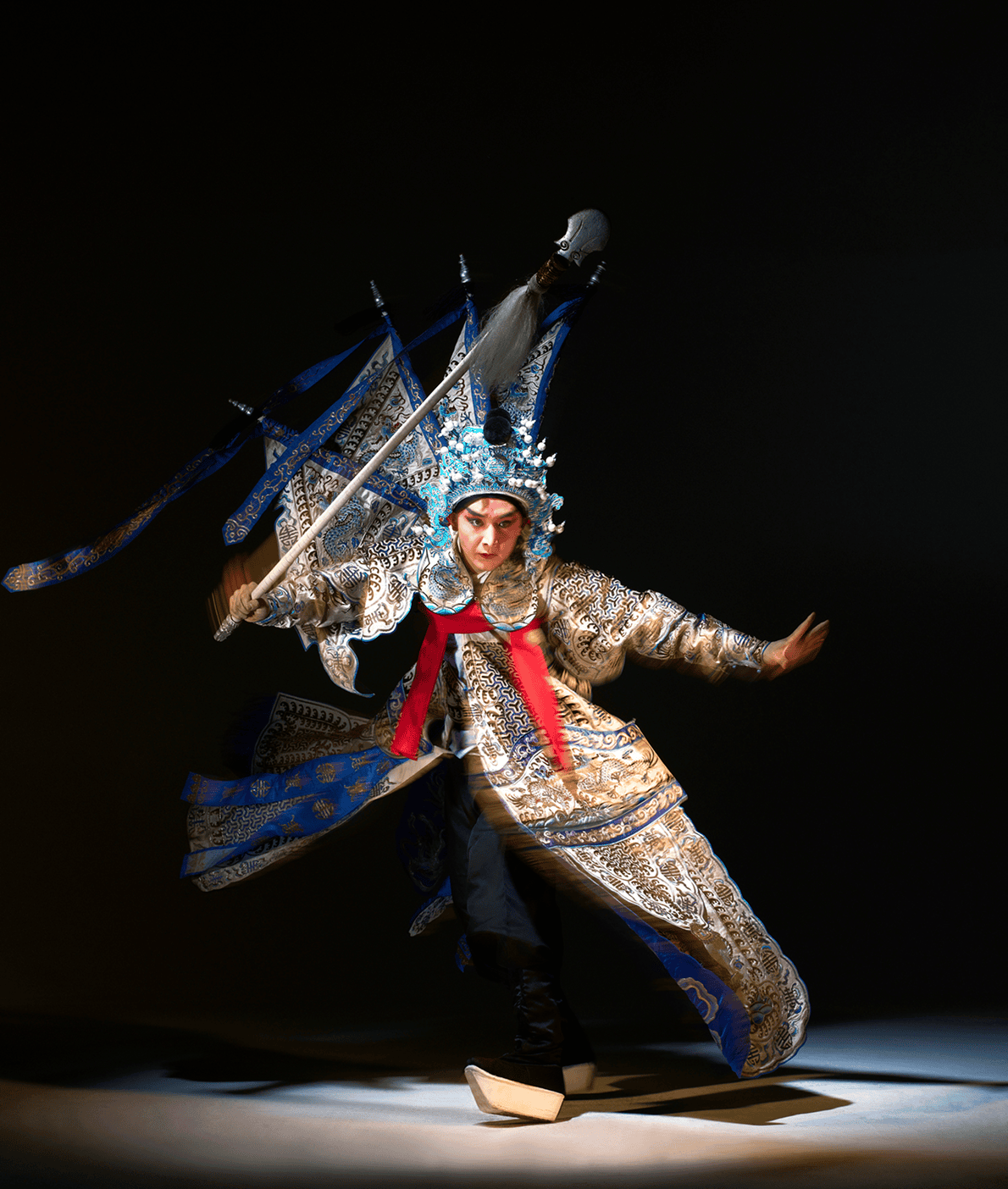 Performer in ornate traditional Chinese opera costume.